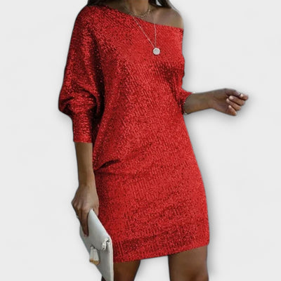 Blizgučių drabužis su kontrastingais akcentais