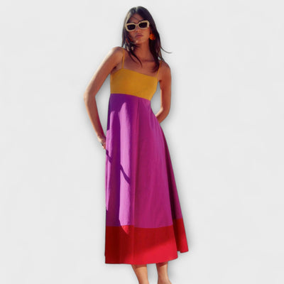 Spalvų blokų suknelė su spaghetti petnešomis