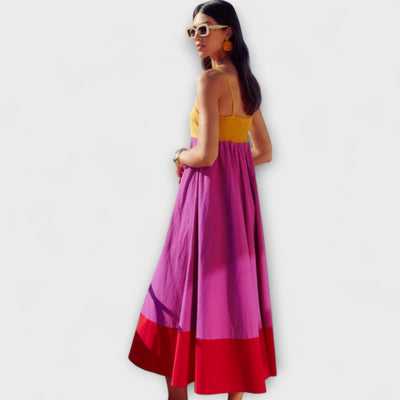 Spalvų blokų suknelė su spaghetti petnešomis