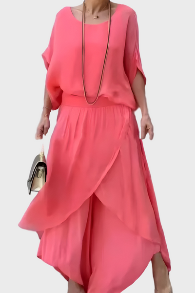 Plačios viršutinės dalies ir suplėšytos kelnės – dviejų dalių sijonas iš šifono