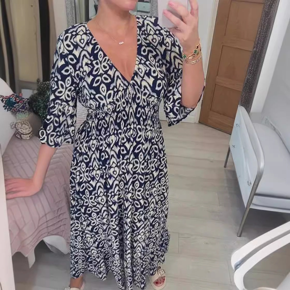 Zlata | Stilinga suknelė su gėlių raštu ir V formos iškirpte