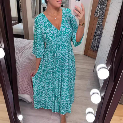 Zlata | Stilinga suknelė su gėlių raštu ir V formos iškirpte