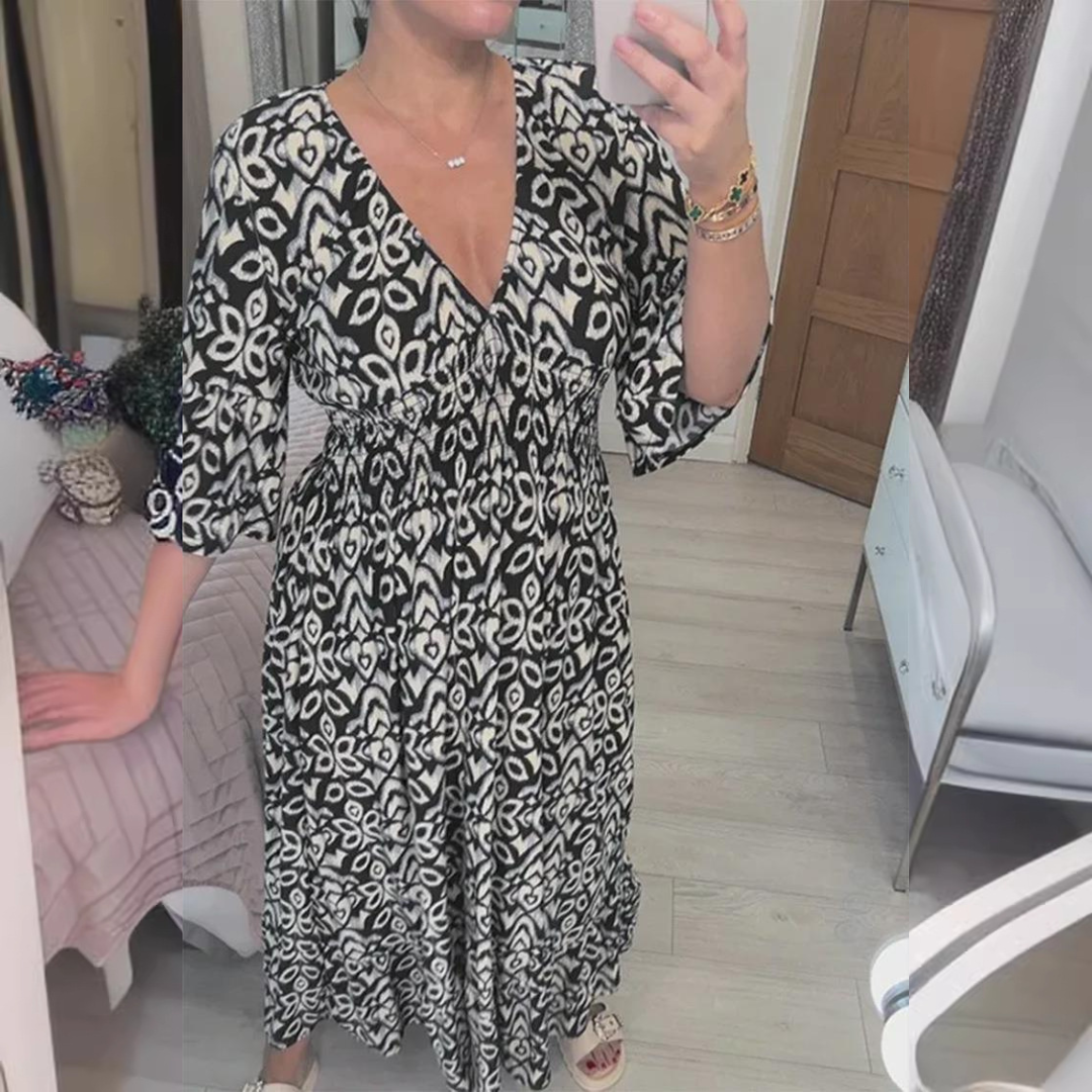 Zlata | Stilinga suknelė su gėlių raštu ir V formos iškirpte